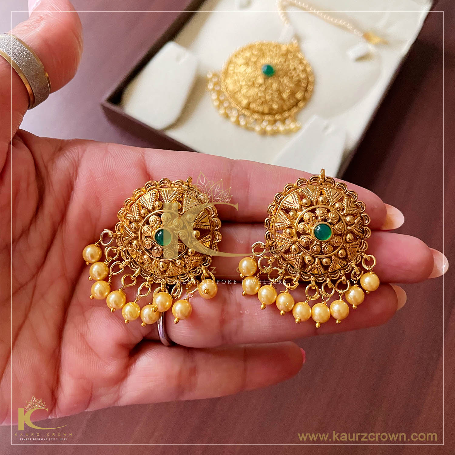 Buy Bindhani Women's Round Gold-Plated Earrings With Red-Green Polki